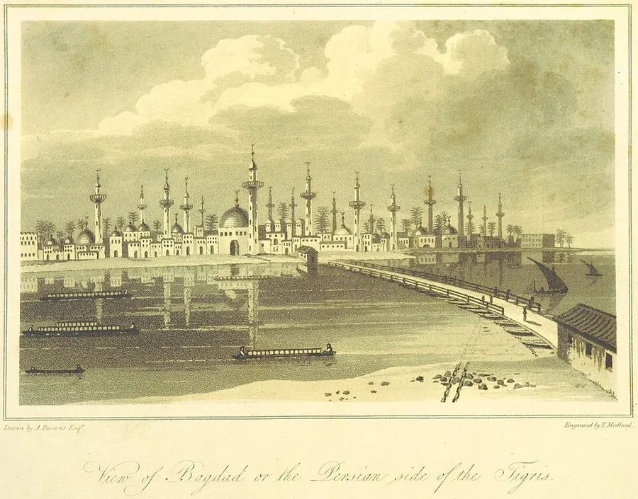 An 1808 aquatint titled 'View of Bagdad or the Persian side of the Tigris': a skyline of minarets, domes and palms reflected in the wide river, flat boats in midstream, and a bridge of boats crossing toward the far bank.