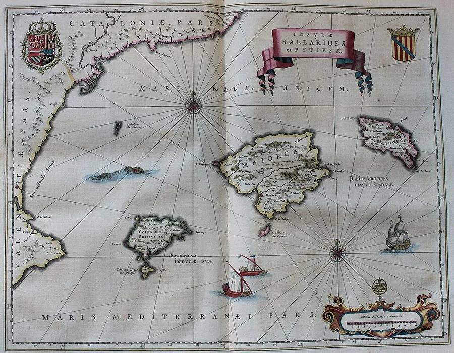 Joan Blaeu’s hand-coloured 1659 sea-chart Insulae Balearides et Pytiusae: Maiorca, Minorca, Yvica (Ibiza) and Formentera set in a blue Mediterranean with compass roses, sailing ships, and decorated cartouches.