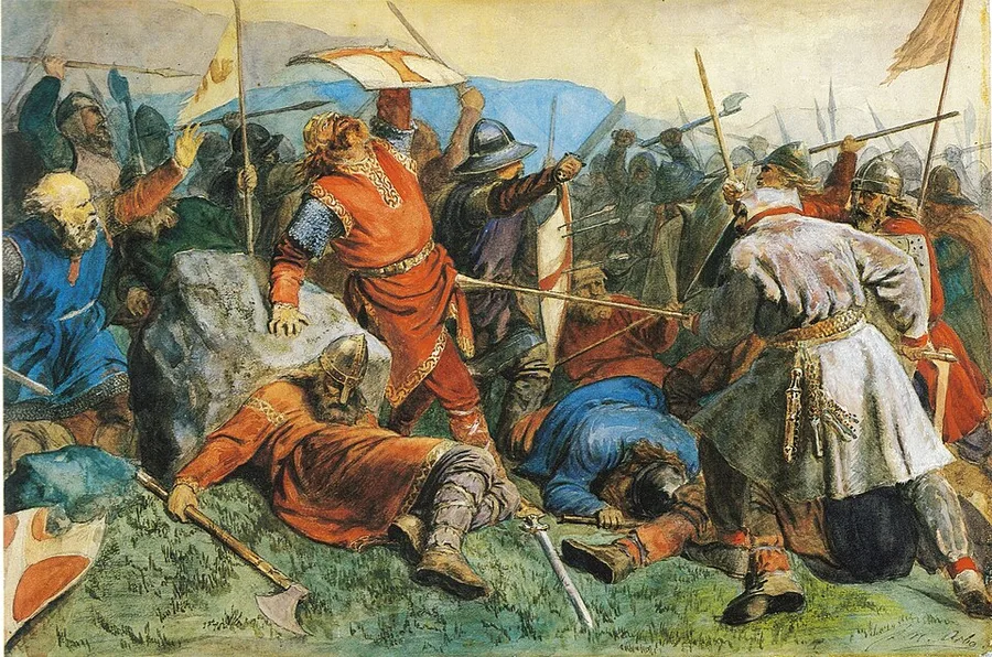Arbo's 1859 painting: King Olav Haraldsson in red, struck down and braced against a boulder as armored warriors clash around him at Stiklestad, banners raised under a swirling grey-gold sky.