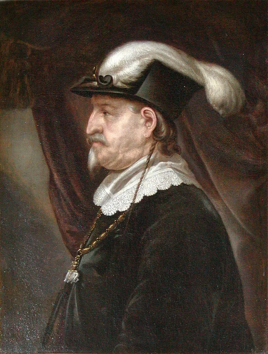 Oil portrait of an elderly, mustached and goateed King Christian IV of Denmark-Norway in profile facing left, wearing a wide-brimmed hat with a long white ostrich-feather plume, dark court dress, a white lace collar, and a gold Order of the Elephant chain.