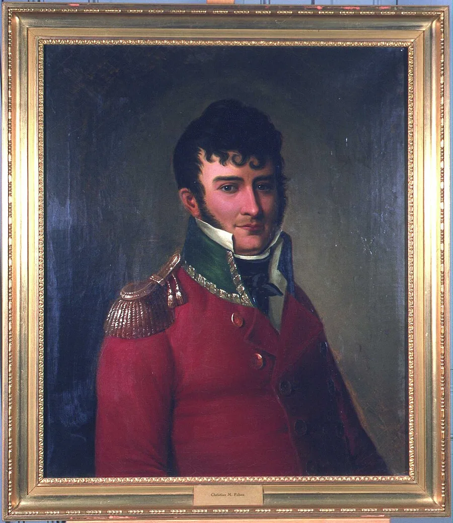 Framed oil portrait of a young dark-haired man with sideburns, in a maroon coat with a gold epaulette and green collar over a white cravat; a small plate on the frame reads 'Christian M. Falsen.'