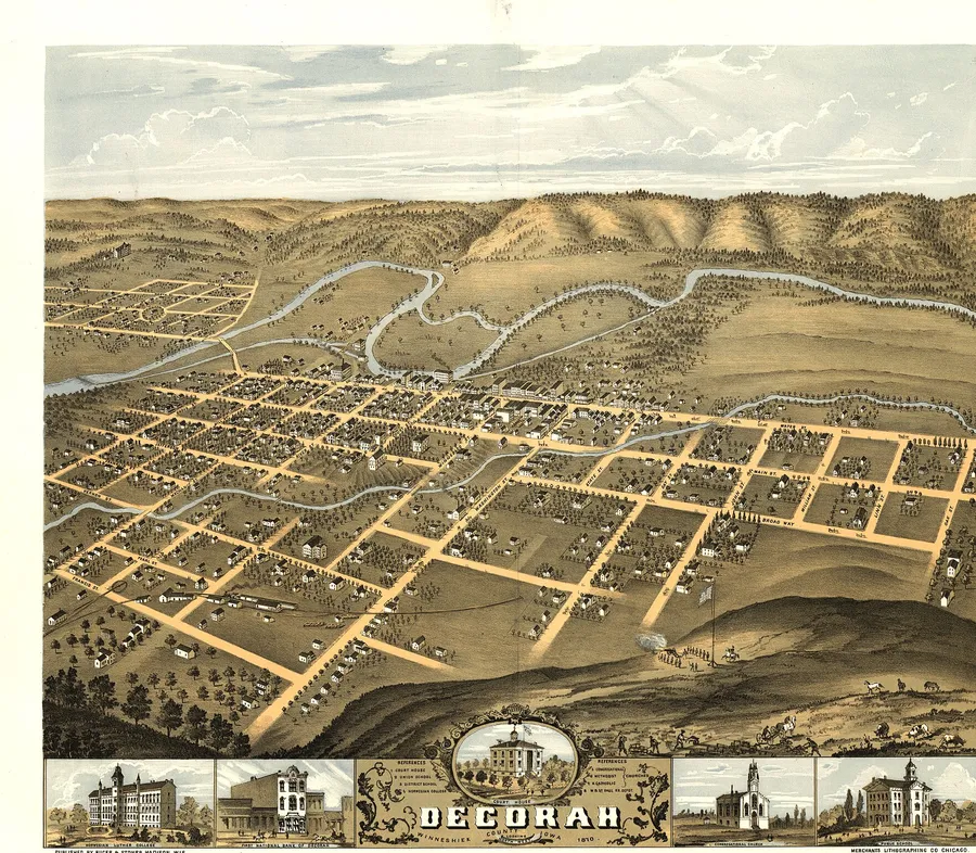 Hand-colored 1870 bird's-eye lithograph of Decorah, Iowa: the street grid on the Upper Iowa River between wooded bluffs, with margin vignettes of town buildings including the Norwegian Luther College.