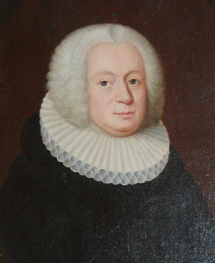 An eighteenth-century portrait of Erik Pontoppidan in the white ruff collar of the Danish-Norwegian clergy, powdered curls framing an even gaze.