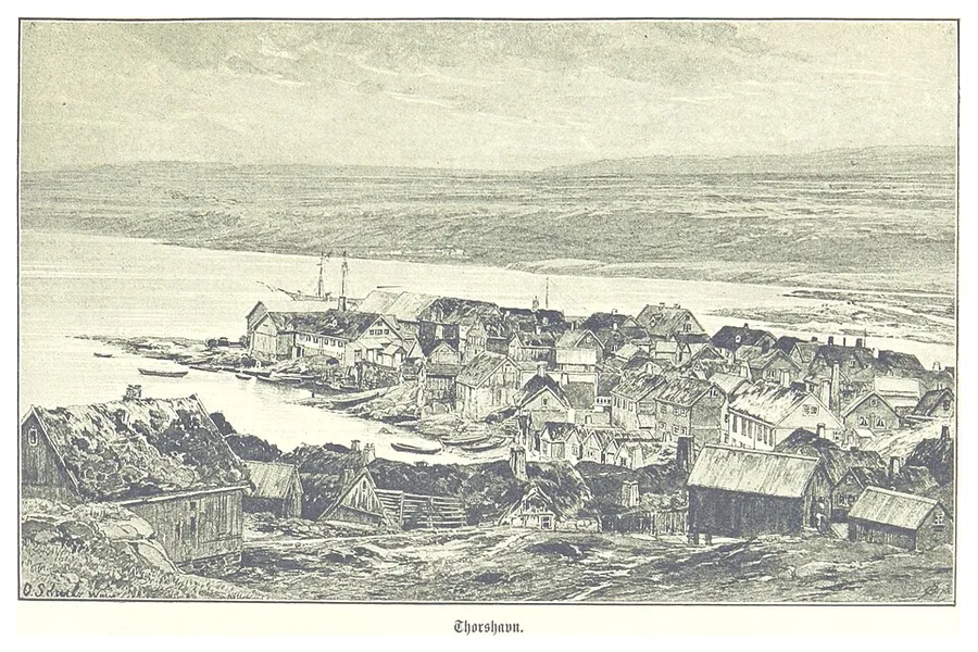 Engraved 1889 view over Tórshavn: turf-roofed timber houses in the foreground, the town's gabled houses crowding the low Tinganes point out into the sound, rowboats at the shore and a two-masted ship offshore.
