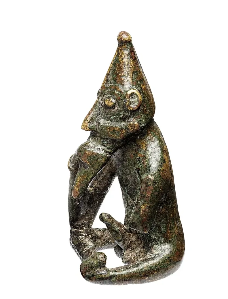 The Rällinge statuette — a small Viking Age bronze of a seated, cross-legged bearded figure in a pointed cap, identified as the fertility god Freyr.