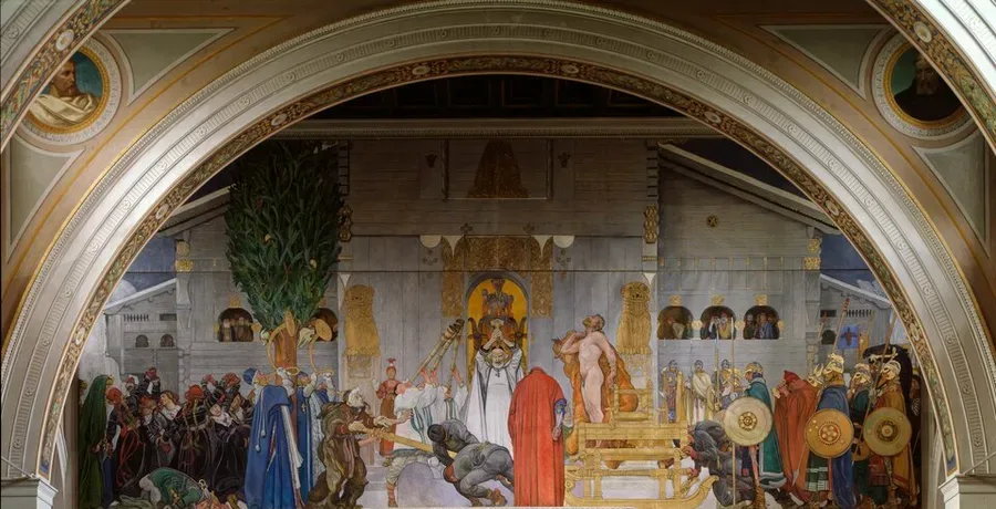 Carl Larsson's arched mural Midvinterblot: a naked king stands on a gilded sledge carried toward a one-eyed priest raising a hammer, with a great timber hall, warriors, and a fir tree behind, set within its stone archway in the Nationalmuseum stairwell.