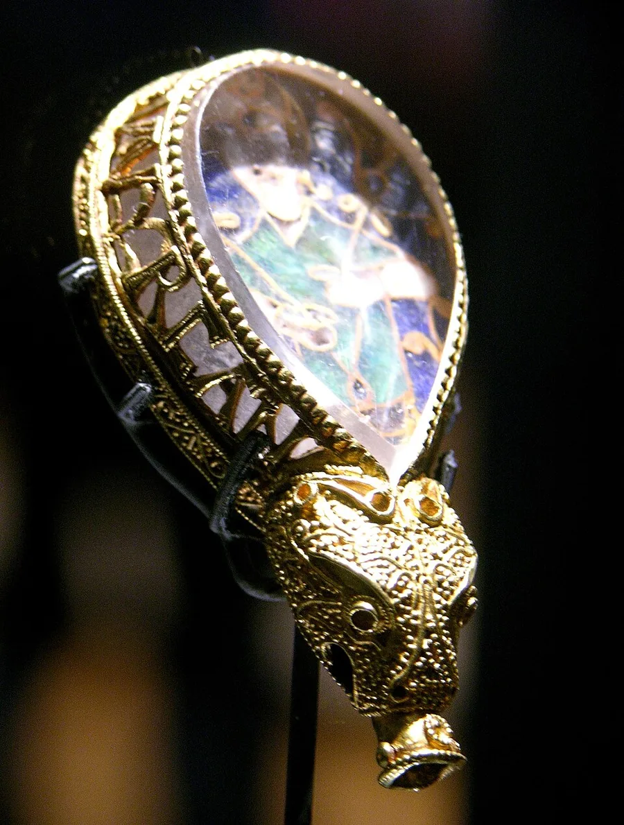 The Alfred Jewel — gold, rock crystal and enamel, made at Alfred's court in the late ninth century, its rim reading AELFRED MEC HEHT GEWYRCAN: Alfred ordered me made.