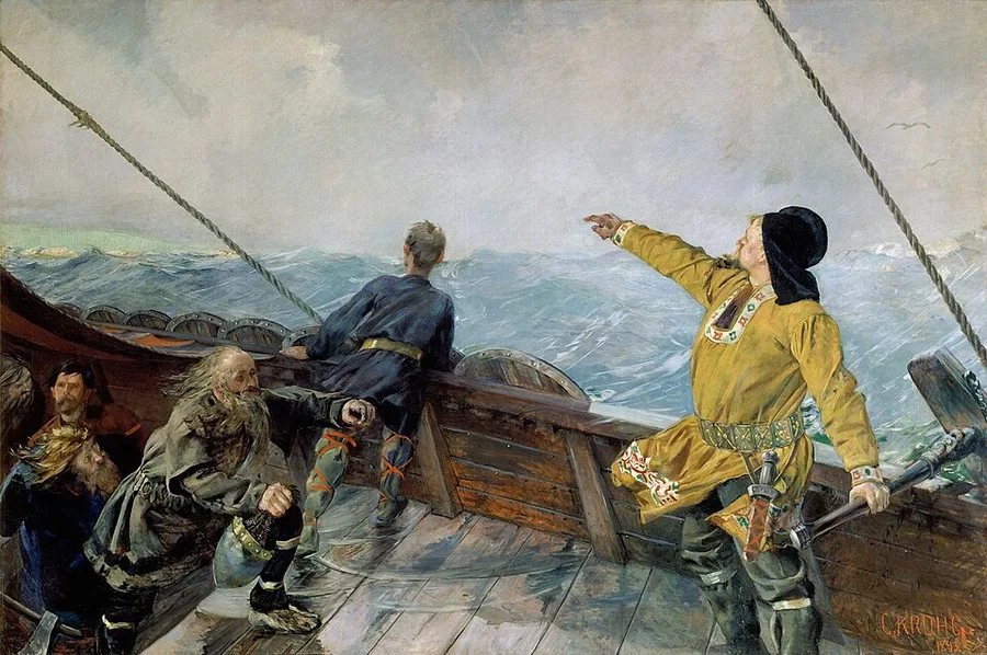 Christian Krohg's painting of a Viking ship's deck in heavy gray-green seas: Leif Erikson in an ochre tunic and dark cap points ahead over the gunwale while the helmsman leans out and crewmen crouch behind; a row of shields lines the ship's side.
