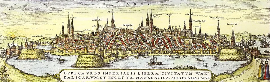 A hand-colored engraved profile prospect of Lübeck labeled 'LVBEC,' its walled old town bristling with church spires including the twin-towered Marienkirche, boats on the harbor below, and a Latin banner naming it a free imperial city of the Hanseatic League.