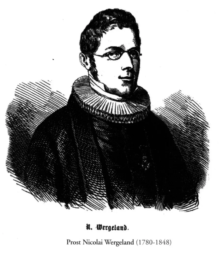 Black-and-white engraving of a man in a clergyman's ruffed collar and round wire spectacles, dark curly hair; printed caption below reads 'N. Wergeland' and 'Prost Nicolai Wergeland (1780-1848).'
