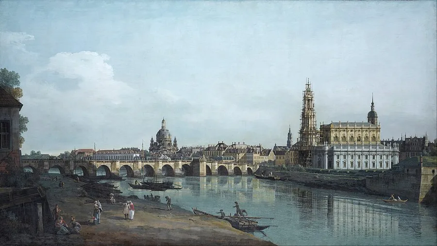 Bellotto's 1748 view of Dresden from the right bank of the Elbe: the arched Augustus Bridge crossing to the old town, the Frauenkirche's stone dome behind, the Hofkirche tower sheathed in scaffolding at right, and figures on the riverside sand in the foreground.