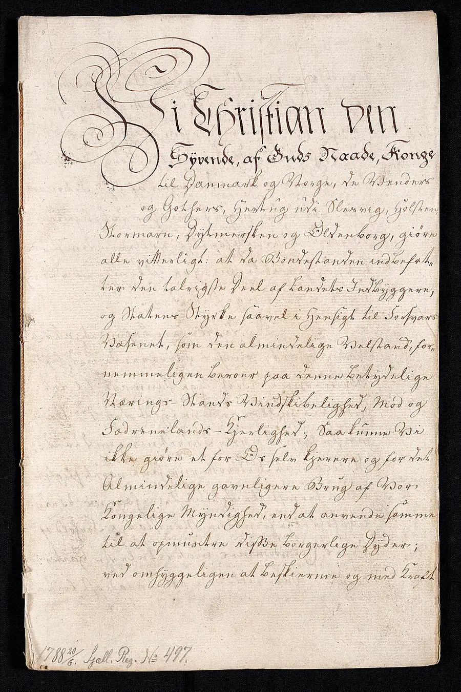 Photograph of the handwritten front page of the 1788 Danish ordinance abolishing stavnsbånd, opening with an elaborate flourished 'Vi Christian Den Syvende...' in formal chancery script on aged paper, with an archival reference number at the bottom.