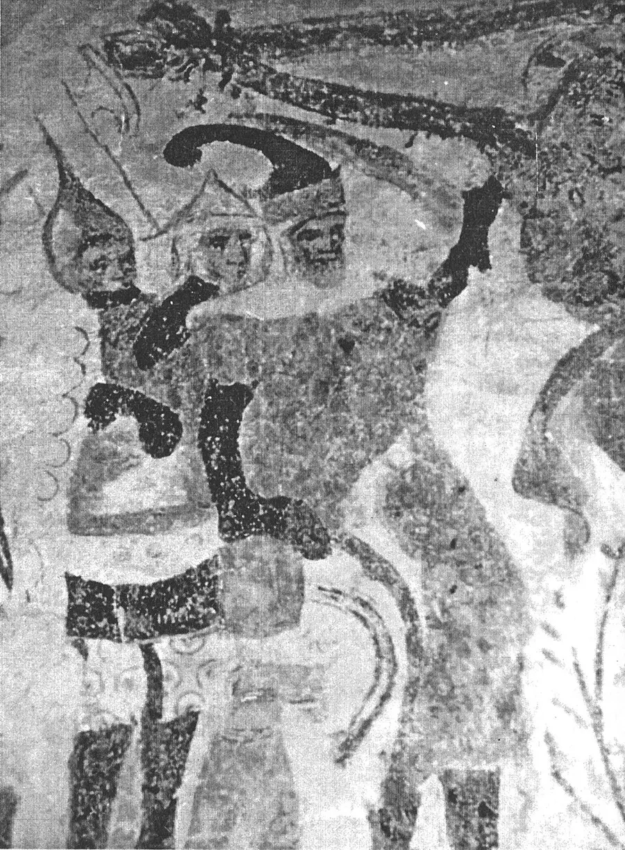 A faded, high-contrast photograph of a medieval church wall painting showing three helmeted, armored figures with swords raised overhead — one of few surviving depictions of the Baltic pirate brotherhood.