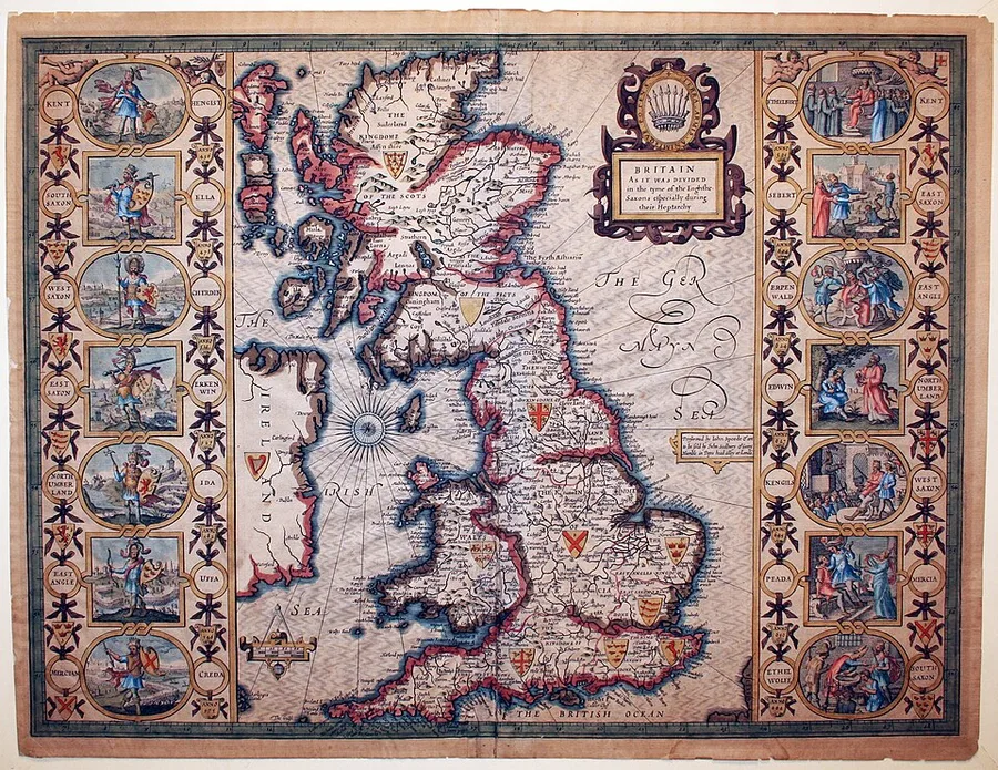 Hand-colored 17th-century engraved map of Britain divided into the seven Anglo-Saxon kingdoms of the Heptarchy, Wessex in the southwest, framed by roundel portraits of Saxon kings and heraldic shields down each side.